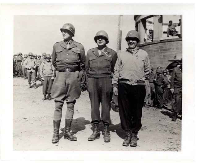 Maj. Gen. Cecil R. Moore From left: Gen. George S. Patton, Maj. Gen. Cecil R. Moore, and unknown Army officer.