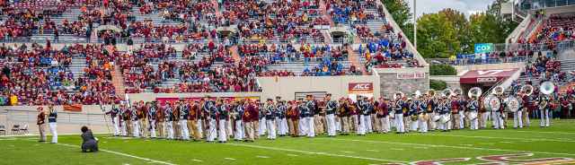 Corps Homecoming The Highty-Tighties and the Highty-Tighty alumni perform during the annual Corps Homecoming football game in Lane Stadium.