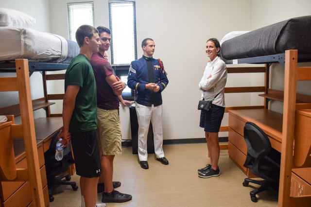 Summer Orientation People look at a cadet room in New Cadet Hall.