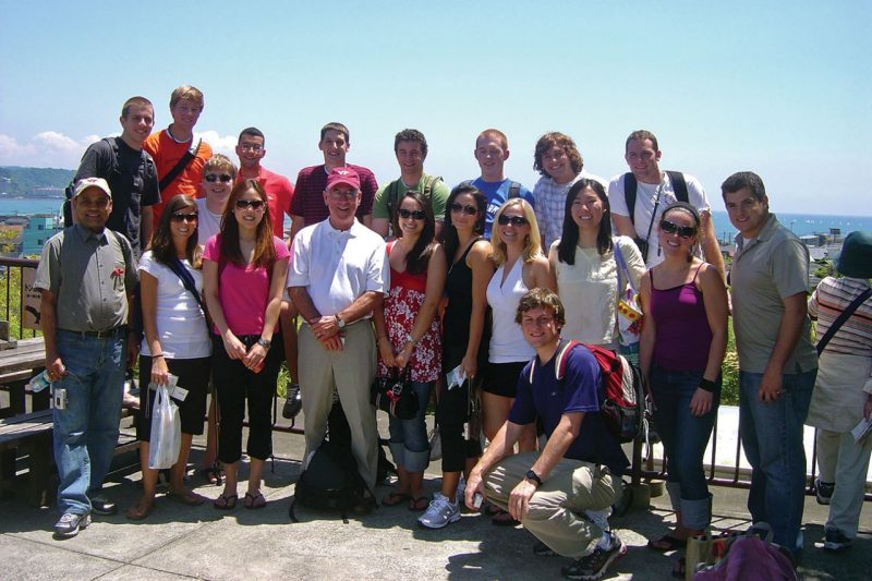 Virginia Tech Adjunct Instructor Mike Swain ’65, at front, fourth from left, assists during a 2007 study abroad program in Japan.