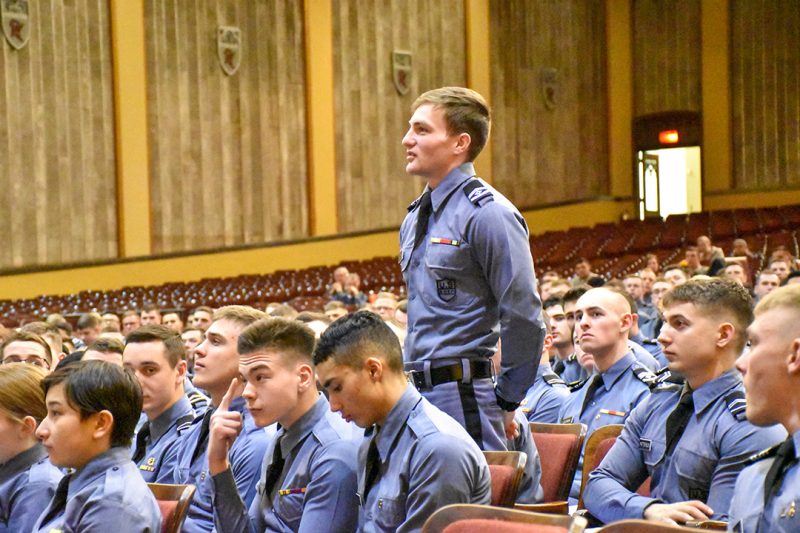 A cadet asks a question during a Corps Lab presentation in Burruss Auditorium.