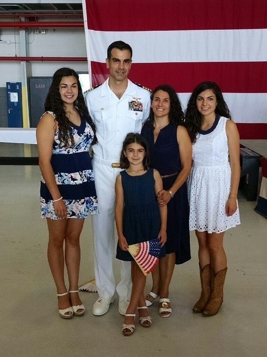 Rear Adm. Steffen stands with his family.