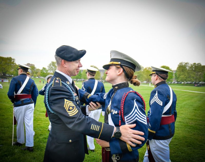 Sgt. Maj. Combs and a cadet share an emotional goodbye embrace on the Drillfield.