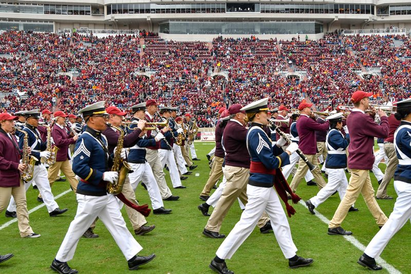 Highty-Tighties and alumni perform in Lane Stadium.