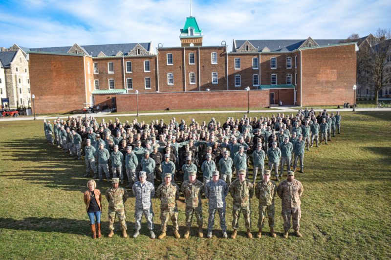 Detachment 875 cadre and cadets form up in the shape of the Air Force logo behind Lane Hall.