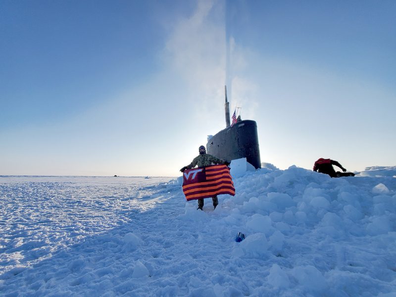 Ens. Jordan Bliss ’18 flies the Virginia Tech flag while surfaced near the North Pole. 
