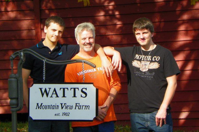 Bernie Watts, at center, with sons Ben, at left, and Jon. 