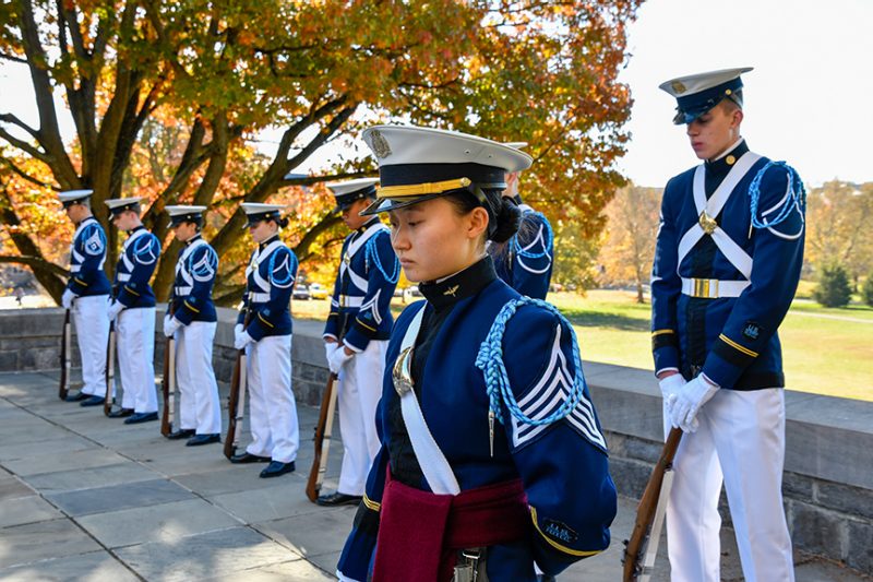 The Gregory Guard waits to perform a rifle salute.