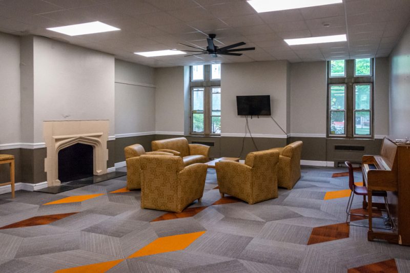 A large lounge in Main Eggleston Hall is filled with plush furniture.